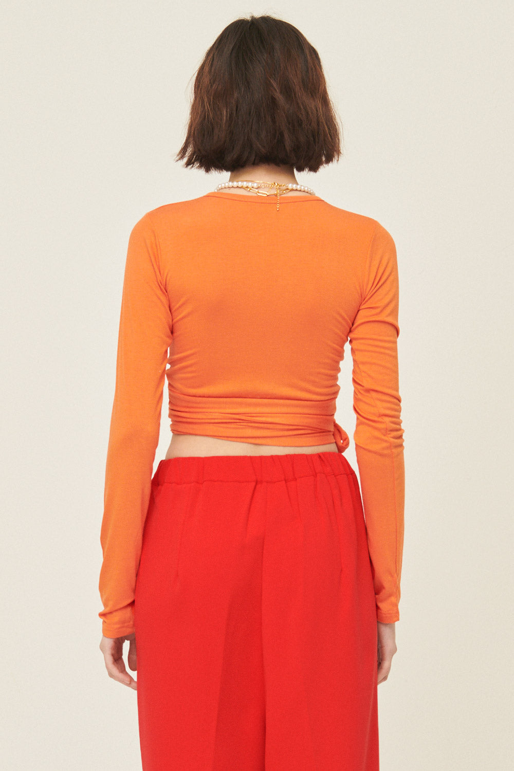 storets.com Mely Buttoned Wrap Top