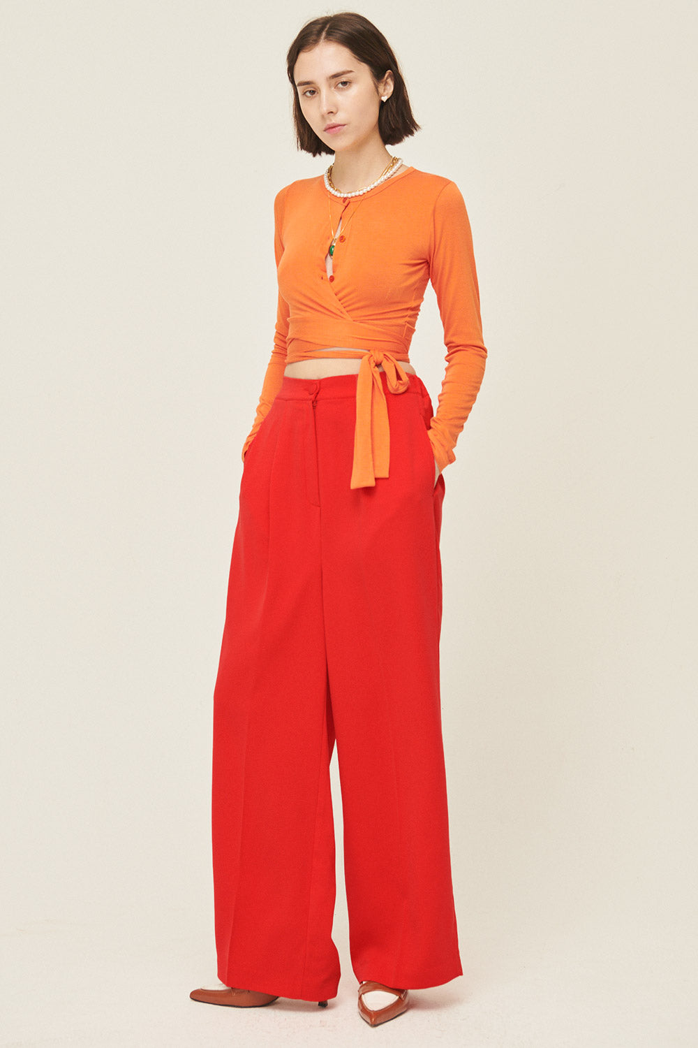 storets.com Mely Buttoned Wrap Top