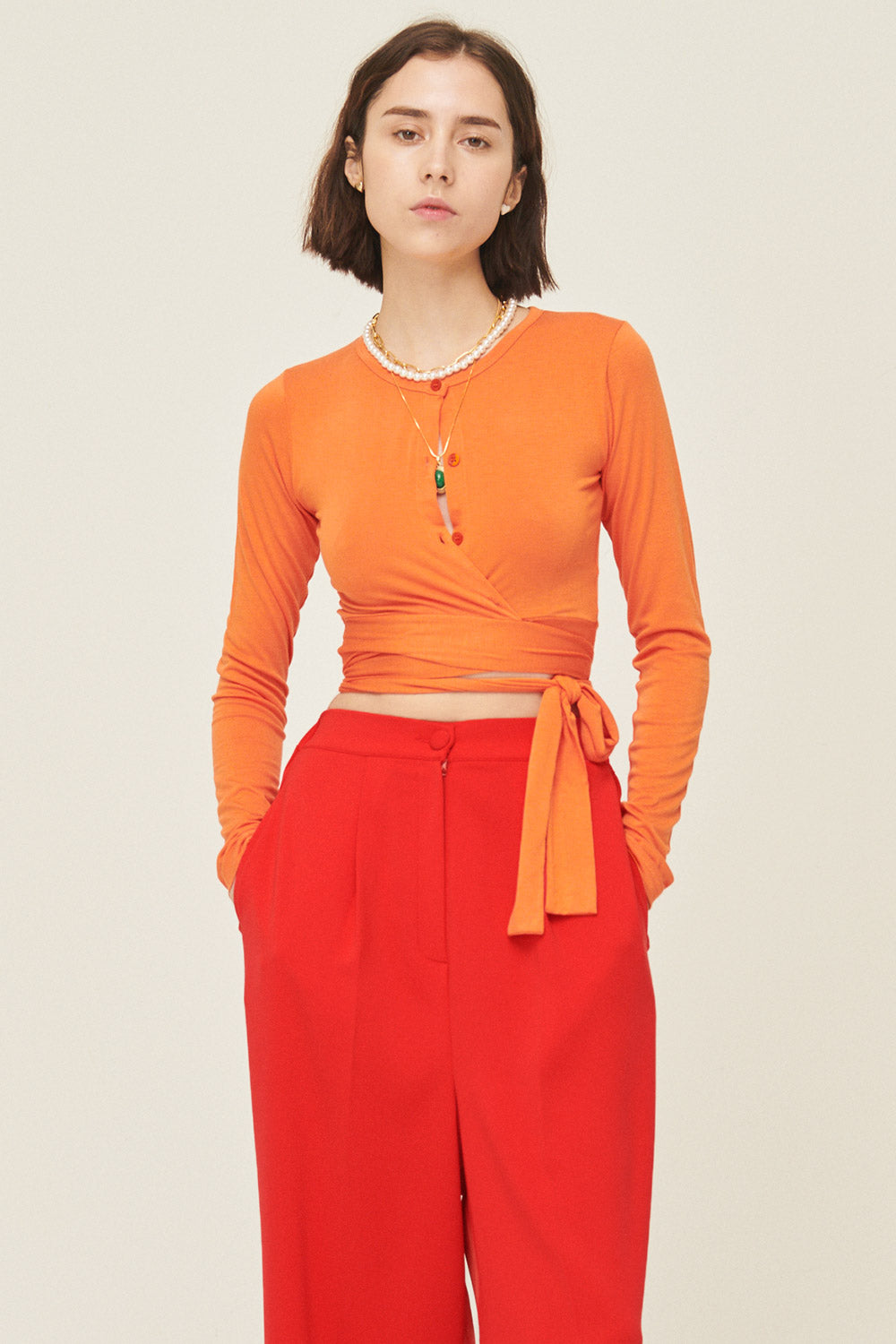 storets.com Mely Buttoned Wrap Top