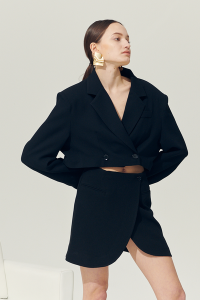 storets.com Re:born Eva Tulip Wrap Mini Skirt