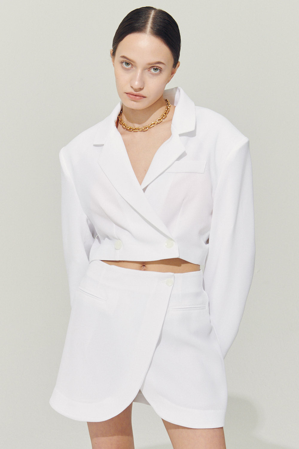 storets.com Re:born Eva Tulip Wrap Mini Skirt