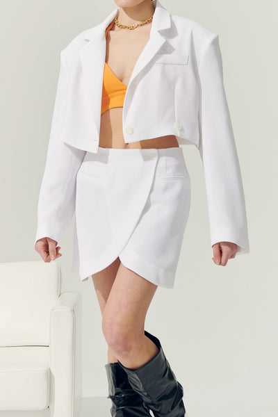 storets.com Re:born Eva Tulip Wrap Mini Skirt