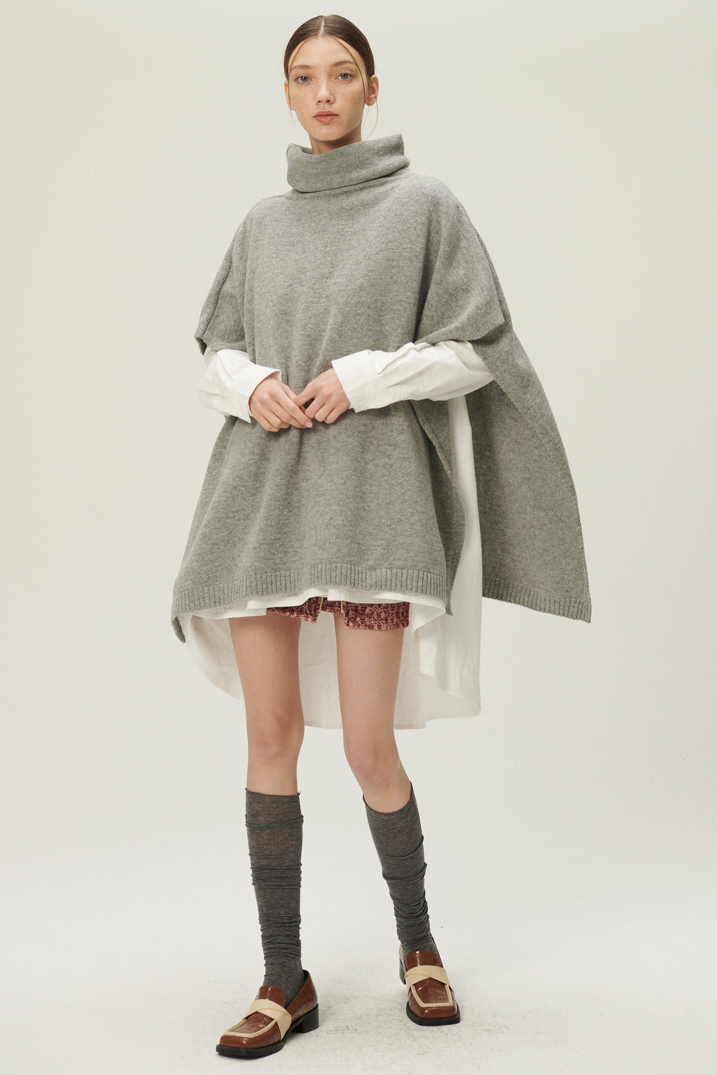 storets.com Nadua Oversized Cape Vest