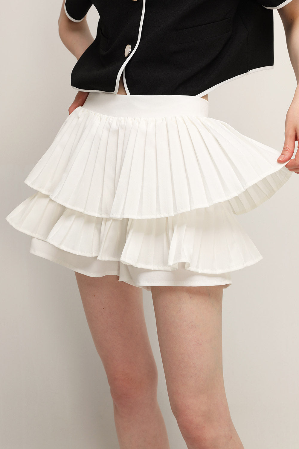 storets.com Clara Pleated Ruffle Skort
