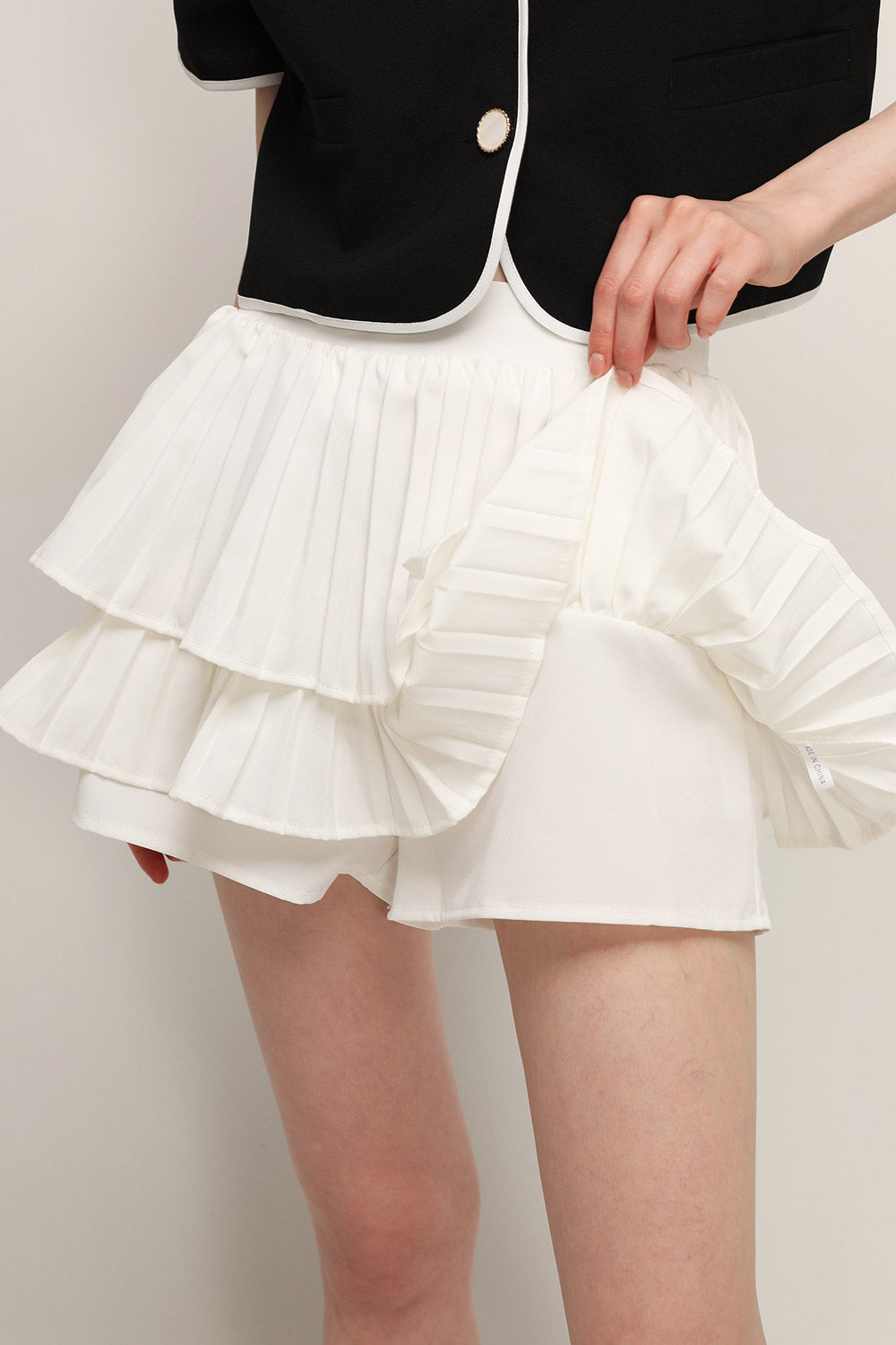 storets.com Clara Pleated Ruffle Skort