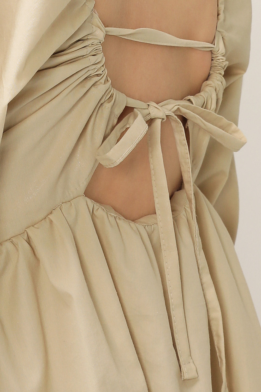 storets.com Joy Coated Babydoll Dress